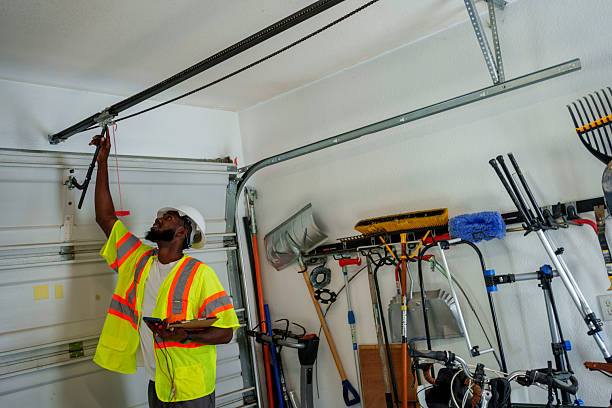 Professional Garage Door Panel Replacement technician working in Toppers, OK
